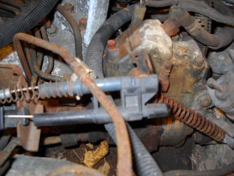 1988 Ford F-250 - Engine bay details showing various components and wiring, some showing rust.