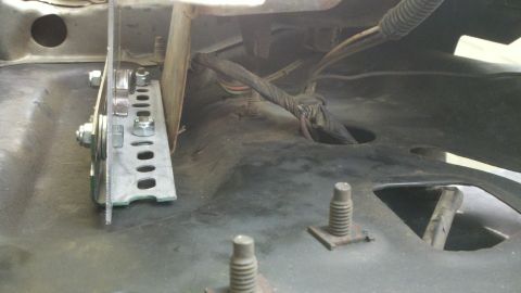 1978 Ford Bronco - A custom bracket and wiring harness are visible in this close-up view of a vehicle's undercarriage.