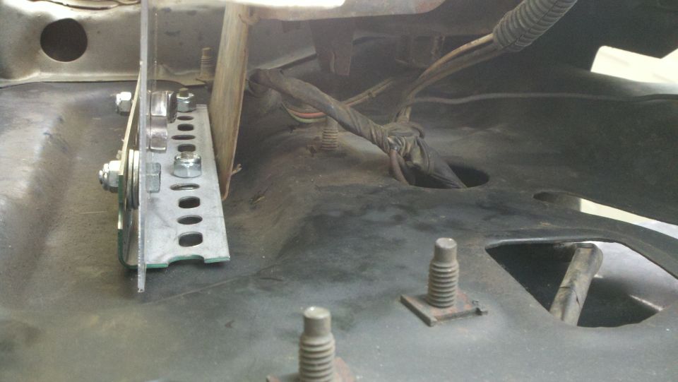 Custom bracket and wiring harness under vehicle