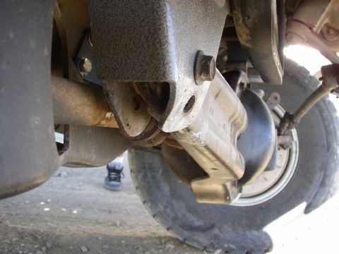 1989 Ford Bronco - Undercarriage view showing suspension components and a tire.