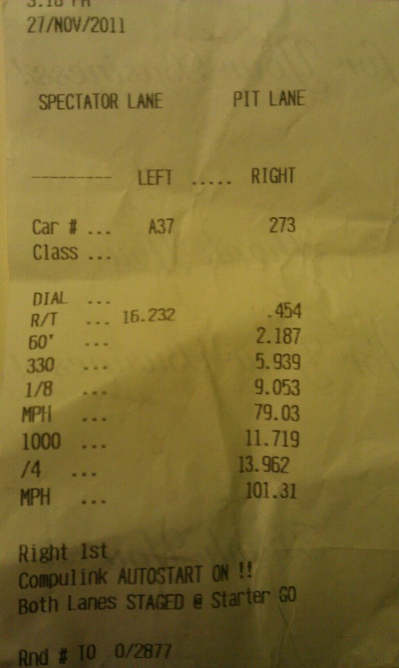 Drag strip time slip showing spectator and pit lane data, car numbers, dial-in, R/T, 60', 330, 1/8 mile, and MPH