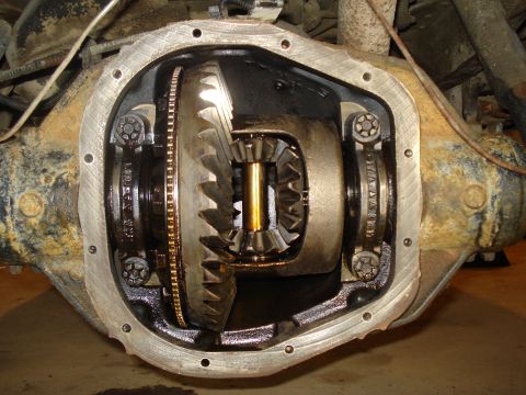 1989 Ford F-250 - Close-up of an open differential housing with internal gears exposed.