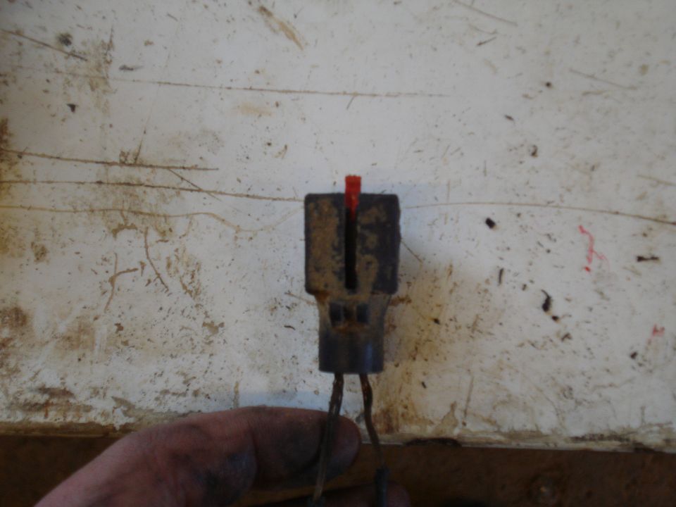 Electrical connector with red indicator and wires