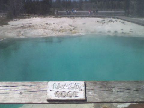 2007 Dodge Caliber - A sign marks the Black Pool, a geothermal feature with vibrant turquoise water.