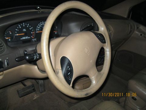 1984 Chevrolet C/K Pickup - Interior view of a car's dashboard and steering wheel, with a date stamp from 2011.