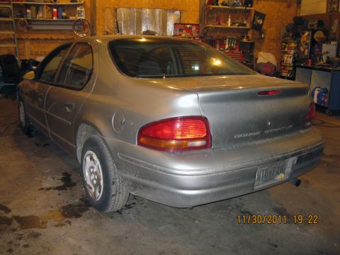 1984 Chevrolet C/K Pickup - Silver Dodge Stratus sedan parked in a garage. Date stamp shows 11/30/2011.