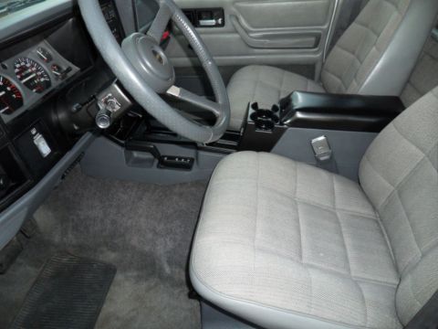 1994 Jeep Cherokee - Interior view of a 1994 Jeep Cherokee, highlighting the seats and dashboard details.