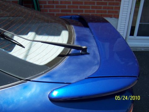1993 Ford Probe - Rear spoiler and windshield wiper on a blue car, photographed on 05/24/2010.