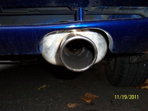 1993 Ford Probe - The rear exhaust pipe of a blue vehicle is shown, with a date stamp of 11/19/2011.