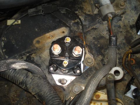 1989 Ford F-250 - A starter solenoid is shown, a critical component for igniting a vehicle's engine.