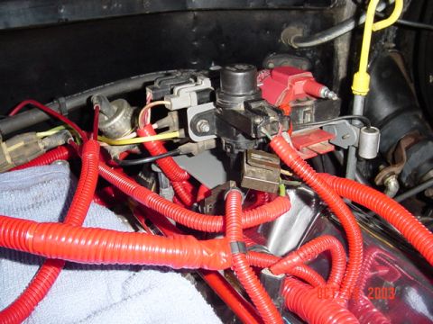 1989 Ford Bronco - See the 1" spacer on the mounts...needed to clear the valve covers
