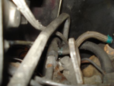 1989 Ford F-250 - Close-up view of engine compartment hoses and wiring, with a Supermotors.net watermark visible.
