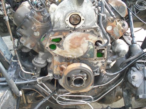 1989 Ford F-250 - Engine block detail with visible coolant and pulley assembly.