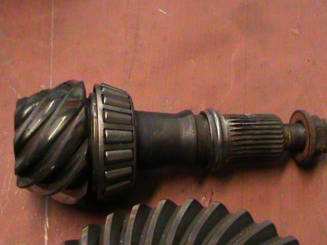 Differential ring gear and pinion shaft with bearing