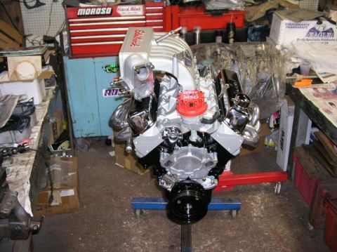 1996 Ford Bronco - Custom V8 engine assembly with polished components, ready for installation.
