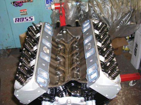 1996 Ford Bronco - Close-up view of an engine block, showing the intake ports and valve train assembly.