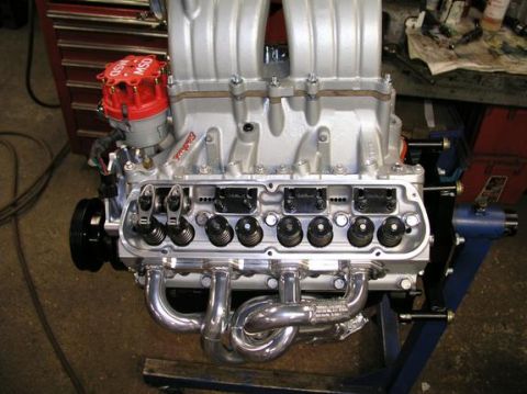 1996 Ford Bronco - Close-up of a V8 engine assembly, aftermarket performance components and a red MSD ignition distributor.
