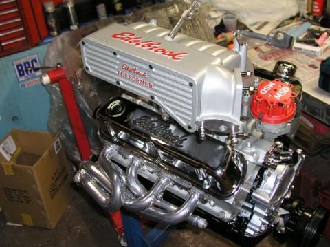 1996 Ford Bronco - Engine components including an Edelbrock intake manifold and chrome valve covers are shown.