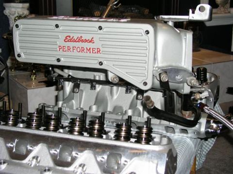 1996 Ford Bronco - Close-up of an engine with an Edelbrock Performer intake manifold.