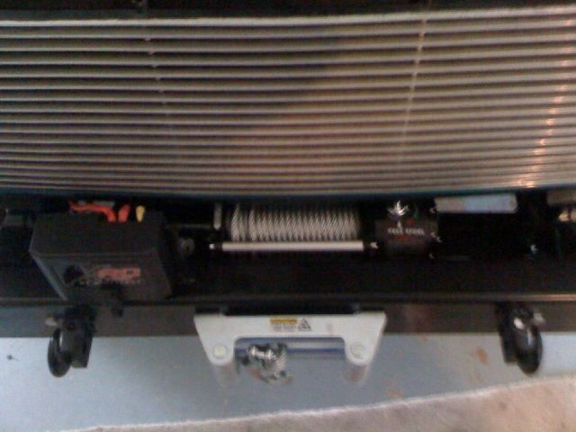 Winch and tow hook on front bumper