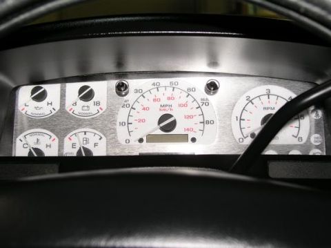 1996 Ford Bronco - Close-up of a vehicle's dashboard gauges, showing speedometer, tachometer, and other indicators.