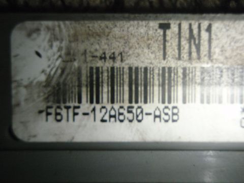 1996 Ford Bronco - Close-up of an engine control module label, showing part number -F6TF-12A650-ASB and barcode.