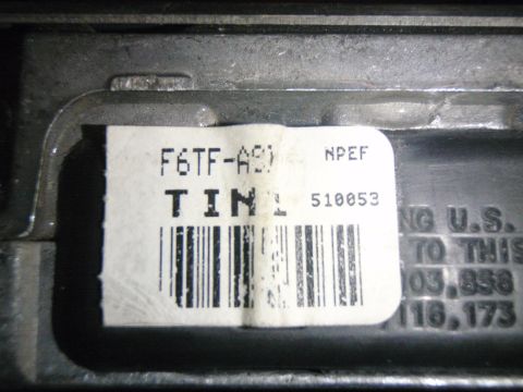 1996 Ford Bronco - Label on an electronic control unit shows part number F6TF-A9D and serial number 510053.