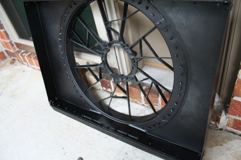 1996 Ford Bronco - This is a radiator fan shroud, likely for an older vehicle, shown outdoors.