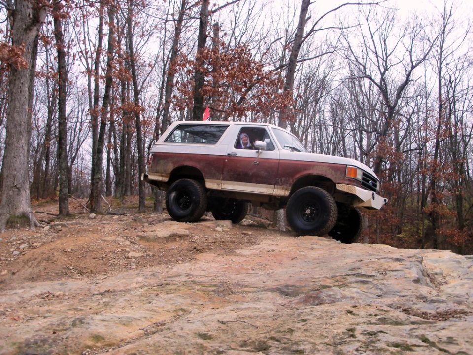 1989 Ford Bronco climbing rocky terrain