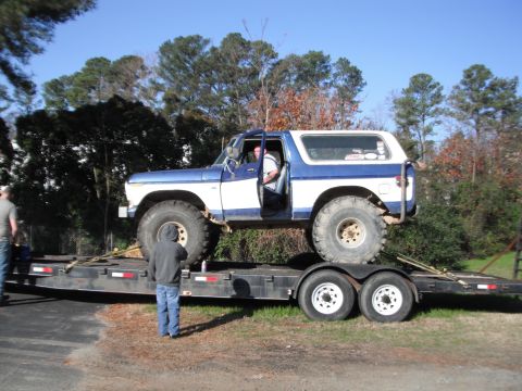 1989 Ford Bronco - This lifted 1978 Ford Bronco is being transported on a flatbed trailer.