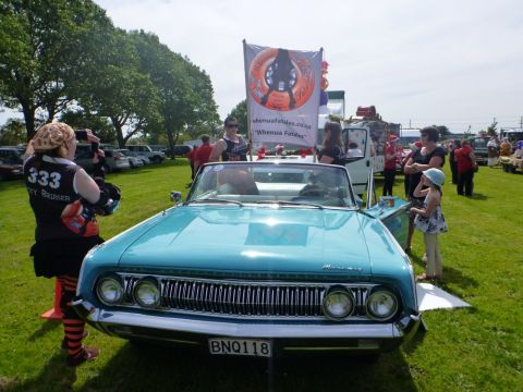 1964 Mercury Monterey - Front view of a turquoise 1964 Mercury Monterey convertible at an outdoor event.