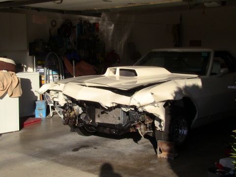 1972 Ford Ranchero - This 1972 Ford Ranchero has sustained significant front-end damage, with the hood scoop and radiator exposed.