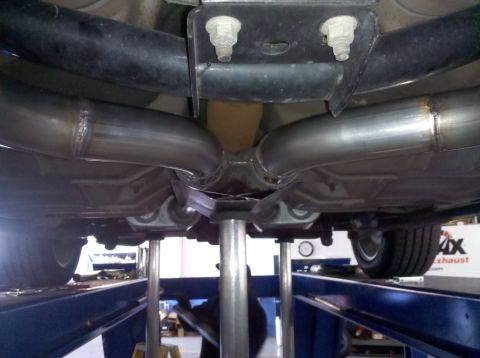 2000 Ford Crown Victoria - The tubes are 2.25 in. welded from mandrel bent 304 stainless sections. The crossover is a Magnaflow unit.