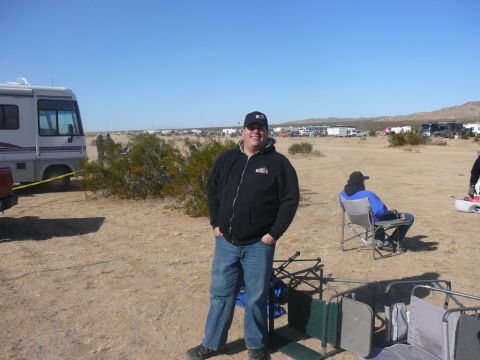 1988 Ford Bronco - Desert gathering with RVs and people enjoying the outdoors.