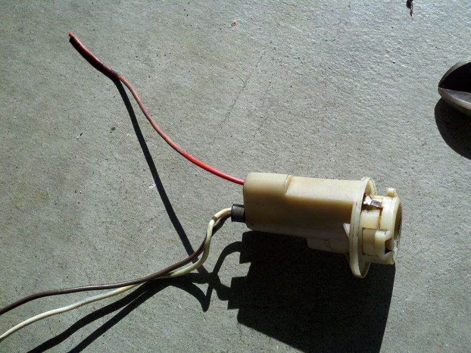 Bulb socket with red and brown wires