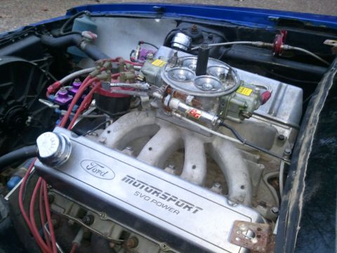 1967 Ford Mustang - Close-up of a Ford Motorsport SVO Power engine, showing the carburetor and intake manifold.