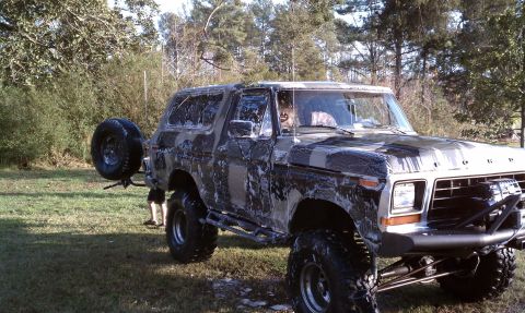 1979 Ford Bronco - This lifted Ford Bronco, covered in soap, appears to be from the late 1970s, not 1979.