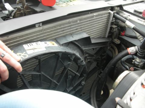 2004 Ford Crown Victoria - Radiator and fan assembly detail, showing the fan shroud with a '3.8L' label.