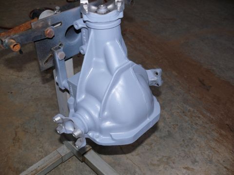 1976 Chevrolet Corvette - Differential housing painted gray and mounted on a stand for work.
