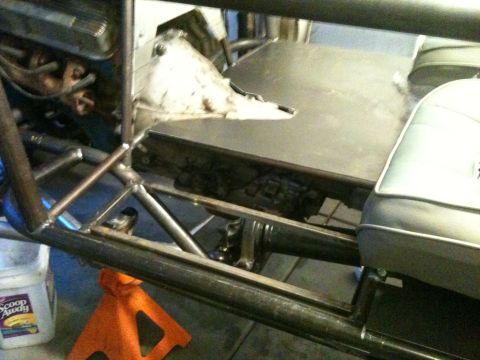 1966 Ford Bronco - Interior view of a custom buggy chassis under construction, showing the frame, engine, and seats.