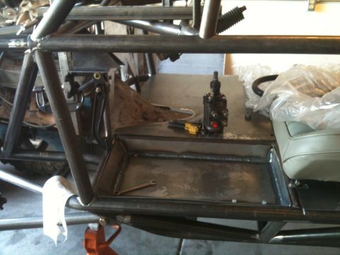 1966 Ford Bronco - Interior view of a custom buggy build, showing roll cage and fabrication work.