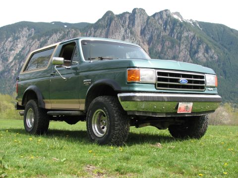 1990 Ford Bronco - 1990 Ford Bronco in a scenic outdoor setting.