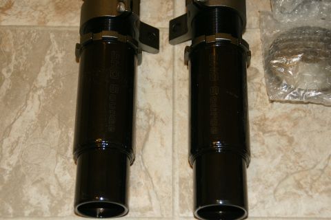 1995 Ford Taurus - Pair of SHO Source coilovers shown, part of a vehicle registry album.