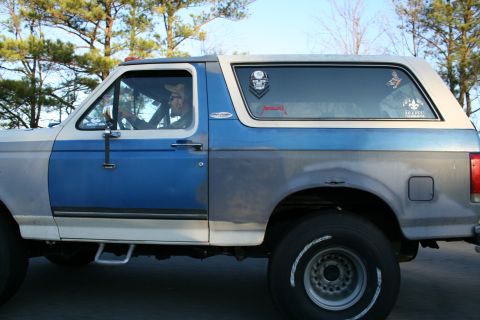 1982 Ford Bronco - This Ford Bronco has a two-tone paint job and custom stickers on the rear window.