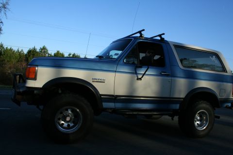 1982 Ford Bronco - This two-tone Ford Bronco is equipped with a roof rack and a heavy-duty front bumper.