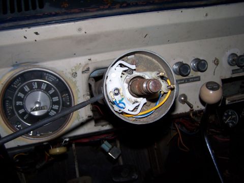 1973 Ford Bronco - Interior view of a 1973 Ford Bronco, focusing on the steering column wiring and instrument cluster.