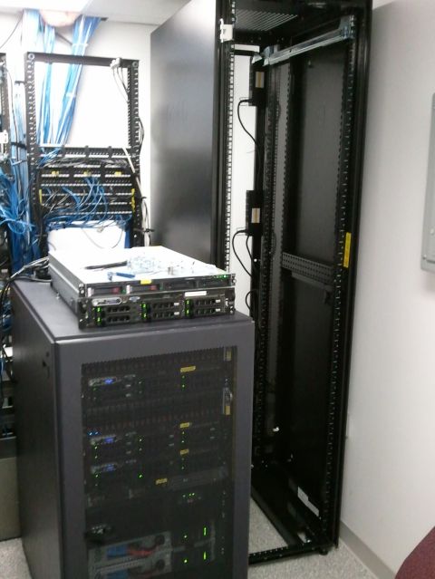 1985 Ford F-150 - A room filled with server racks, network cables, and computer equipment.