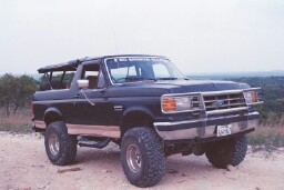 1988 Ford Bronco - This Ford Bronco is equipped with a soft top and appears to be modified for off-road use.