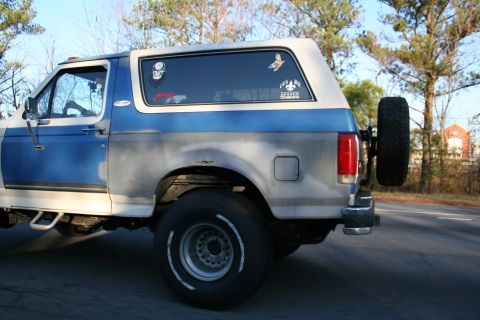 1982 Ford Bronco - This Ford Bronco shows a two-tone paint scheme and a spare tire on the back.
