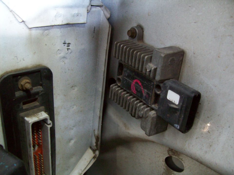 Engine control module with heatsink and connector